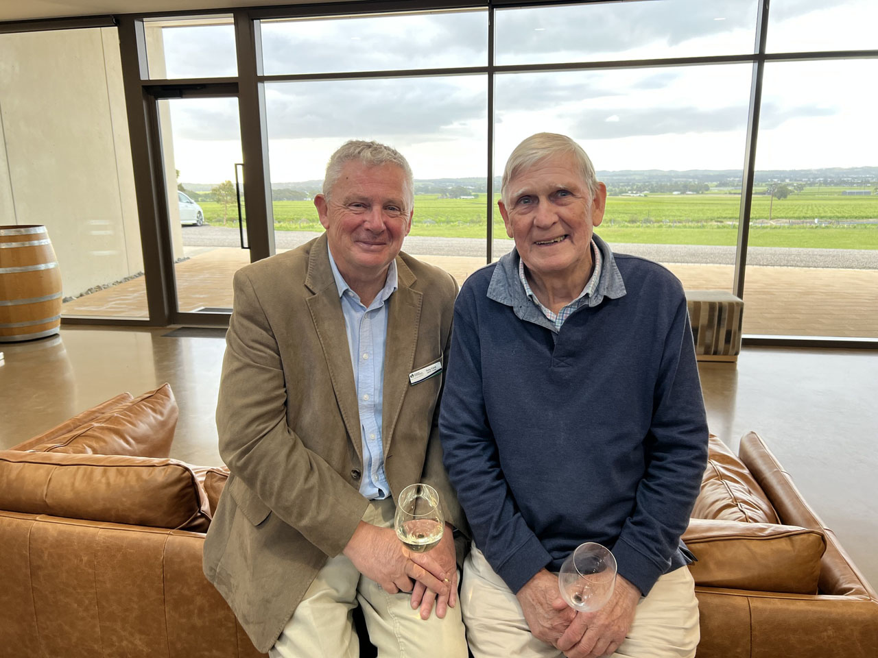 Tony Clark and Barrie Lloyd enjoy the view at Barossa Cellars.