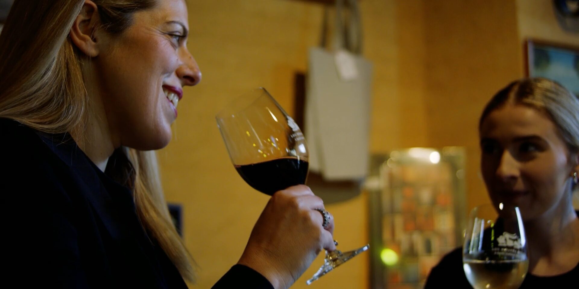 Victoria Miranda from Lou Miranda Wines drinks wine with a friend