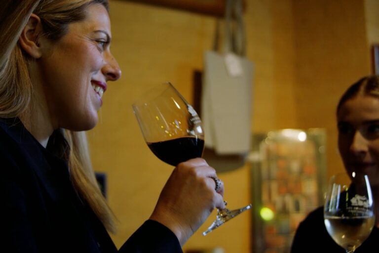 Victoria Miranda from Lou Miranda Wines drinks wine with a friend