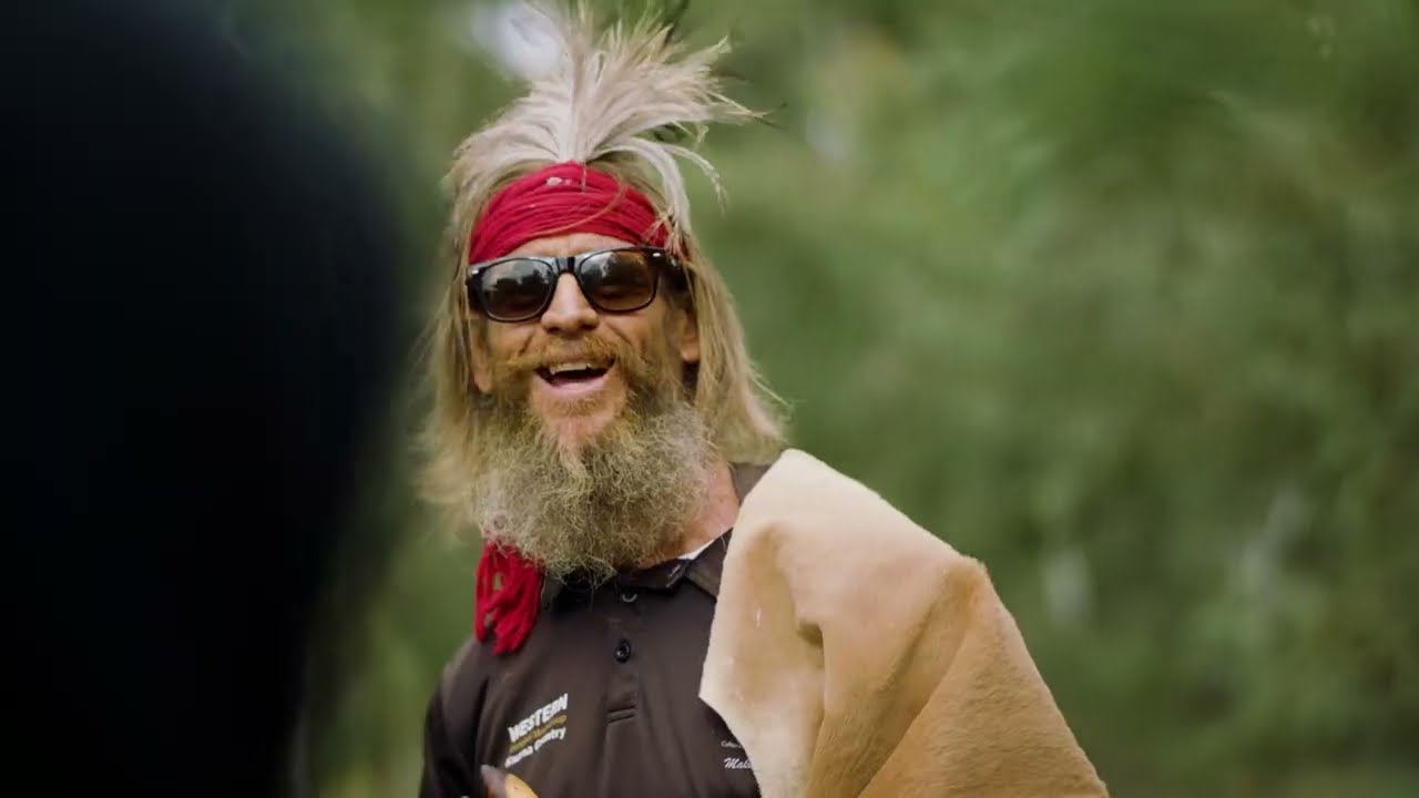 Yuandamarra smiles wearing sunnies