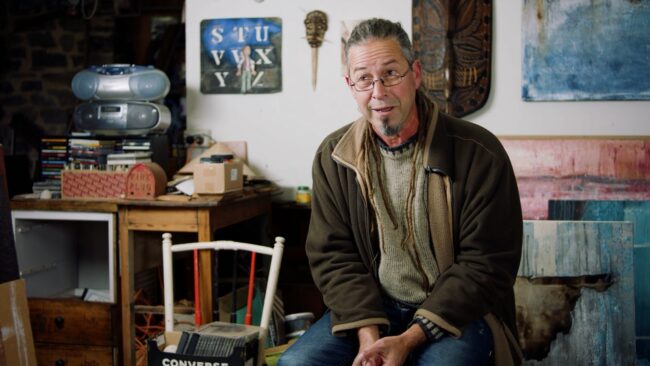 Stuart Hoerisch sits in his arts studio in the Barossa Valley