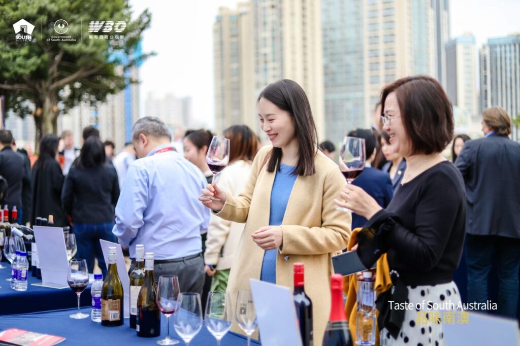 People sample wine at the Taste of SA delegation in China