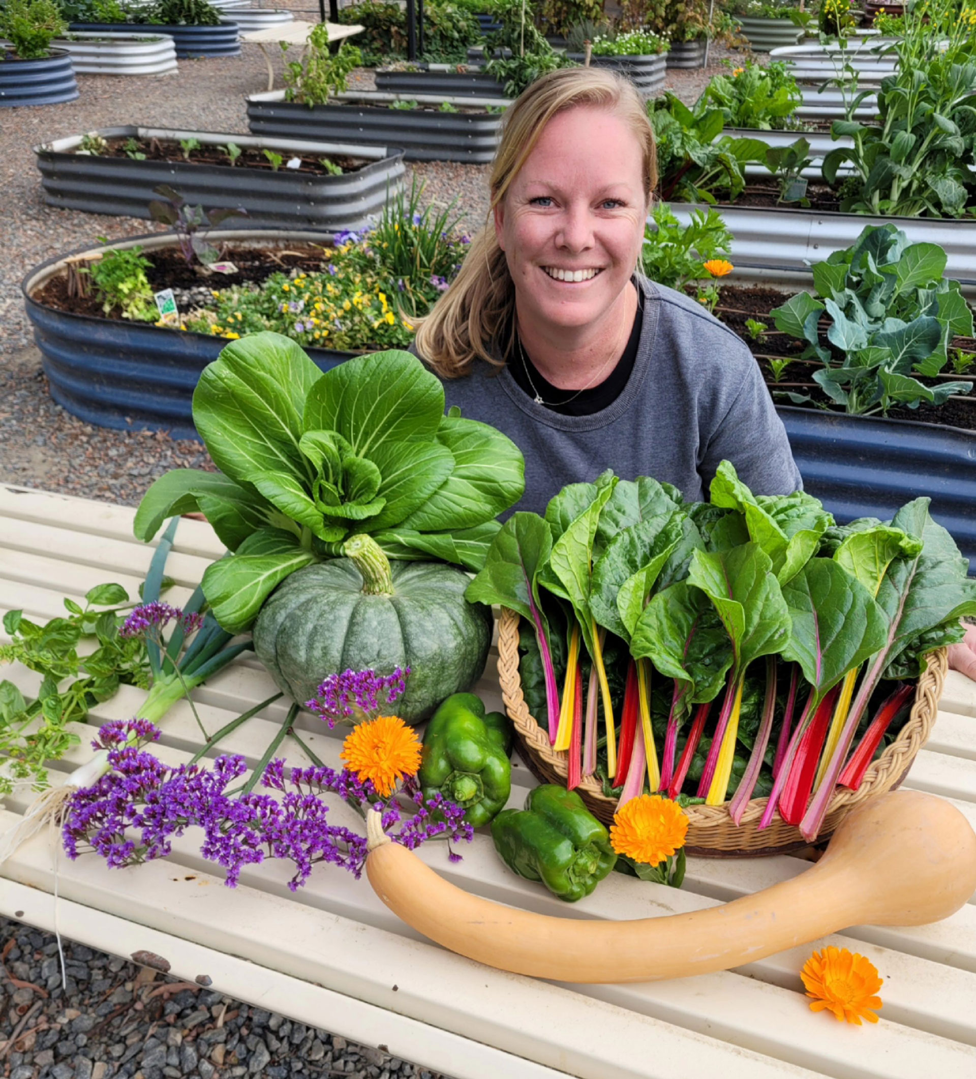 Aleisha Lynch with vegetables she's grown